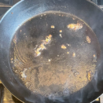 This Cheap Pantry Staple Gets Even the Crustiest Cast-Iron Clean Without Harming It