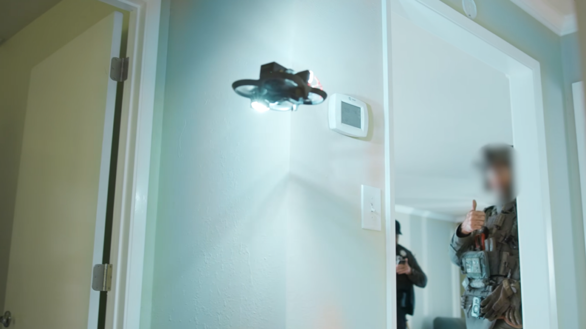 Bizarre police video shows drone taking knife from motionless suspect